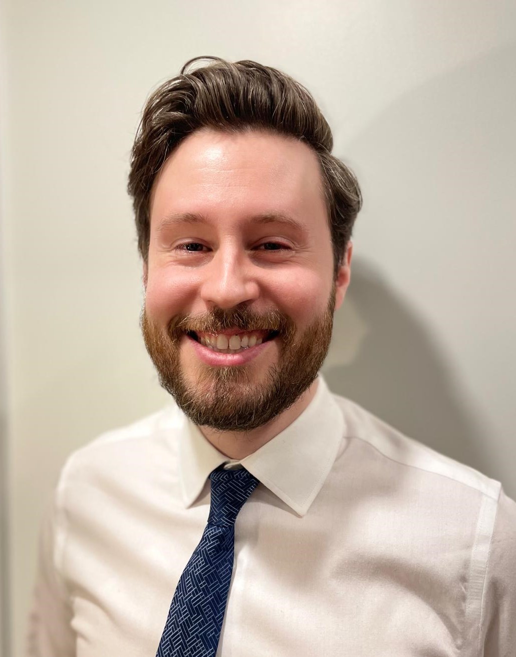 Image of man looking at camera