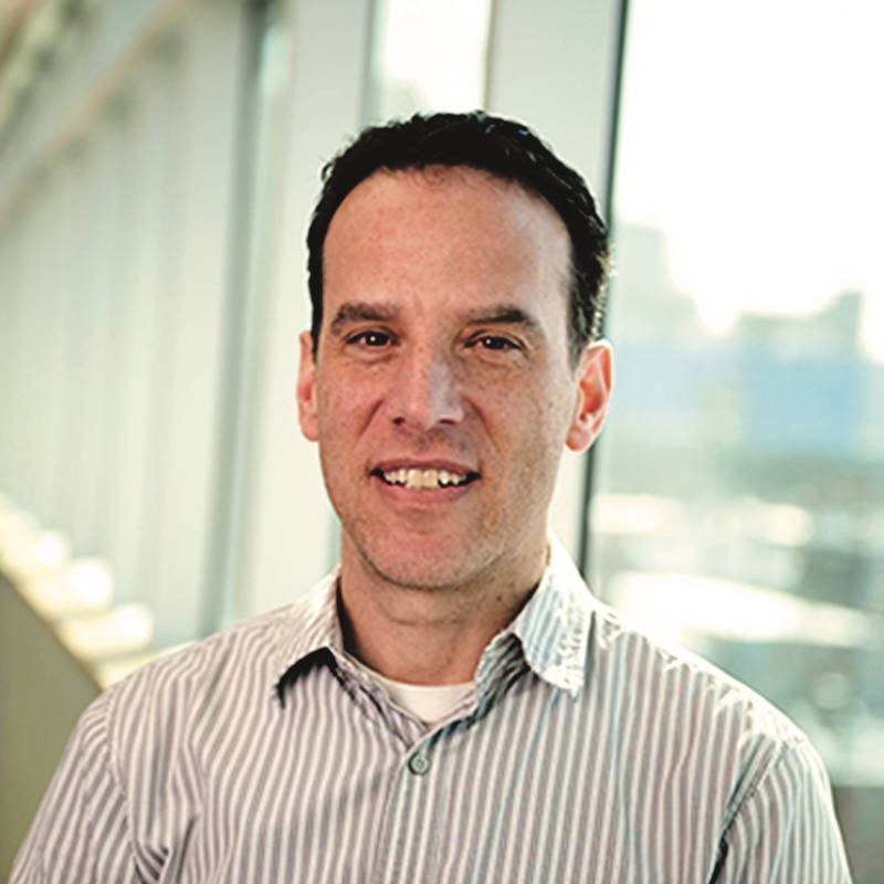 Image of man looking at camera